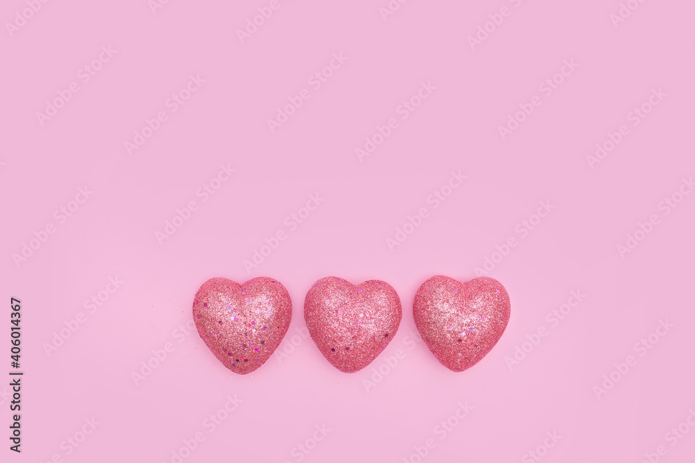 Obraz premium Pink hearts on pink background. Love concept. Valentines day background.