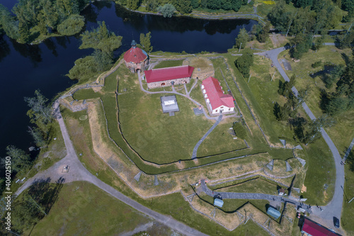 Above the ancient fortress of Korela on a sunny June day (shot from a quadcopter). Priozersk, Leningrad region, Russia photo