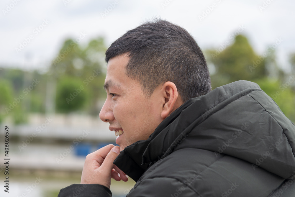 young asia man smile with little white hair young asia man smile with little white hair
