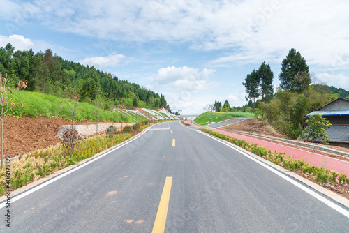 new asphalt road in the country © xiefei