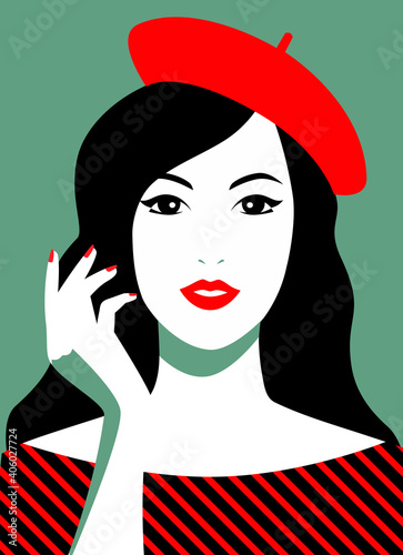 Brunette in a red beret on a green background