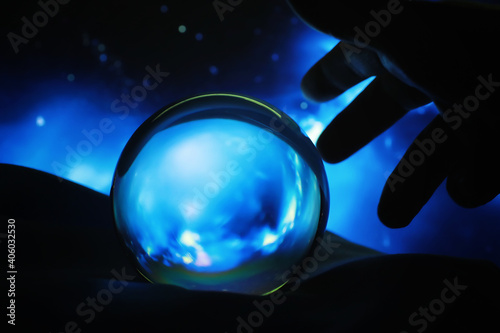 Astrological background. Crystal ball with predictions. Horoscope of the stars. Fortune telling and determination of fate. Soothsayer with a crystal ball.