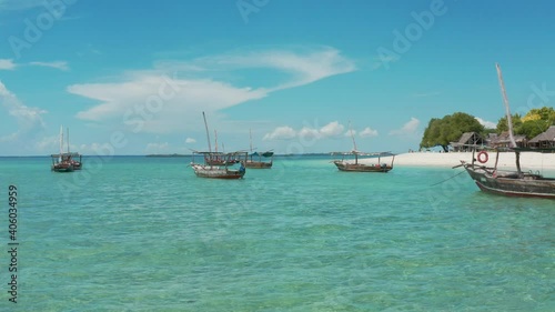 4K aerial drone footage of boat in the blue ocean