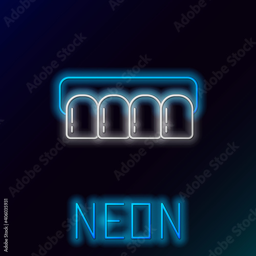 Glowing neon line Dentures model icon isolated on black background. Teeth of the upper jaw. Dental concept. Colorful outline concept. Vector.