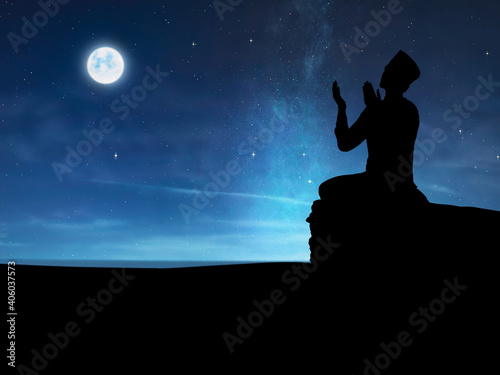 Silhouette of a muslim pray