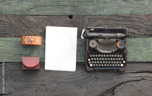 old typewriter on an ancient wooden table
