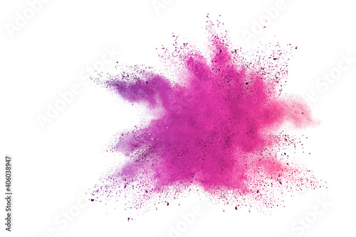 Freeze motion of pink color powder exploding on white background. 
