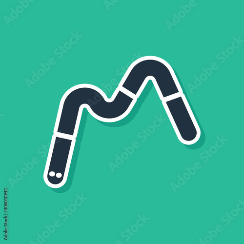 Blue Jelly worms candy icon isolated on green background. Vector.