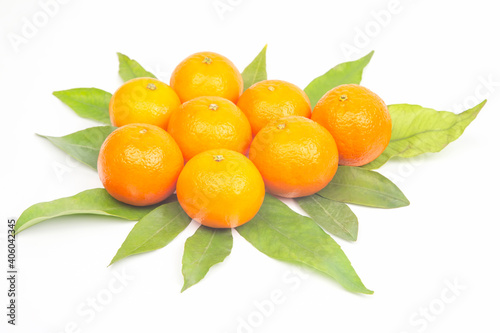 Mandarin with leaves on a white background