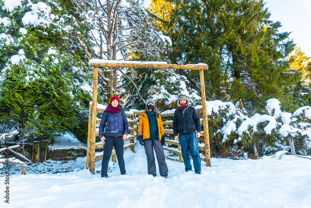 A group of friends enjoying the snowy forest in the town of Oiartzun in Peñas de Aya, Gipuzkoa. Basque Country A group of friends enjoying the snowy forest in the town of Oiartzun in Peñas de Aya, Gipuzkoa. Basque Country