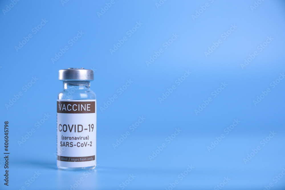 Coronavirus vaccine - The medical concept. Ampoule with Covid-19, SARS-Cov-2 vaccine. Copyspace. Vaccination, immunization, treatment to cure Covid 19 Corona Virus infection Concept Coronavirus vaccine - The medical concept. Ampoule with Covid-19, SARS-Cov-2 vaccine. Copyspace. Vaccination, immunization, treatment to cure Covid 19 Corona Virus infection Concept