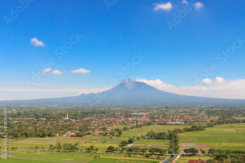Aerial view of Mount Merapi Landscape with rice field and village in Yogyakarta, Indonesia Volcano Landscape View