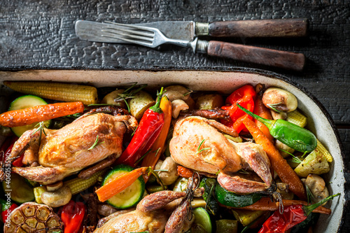 Homemade roasted quails wit...