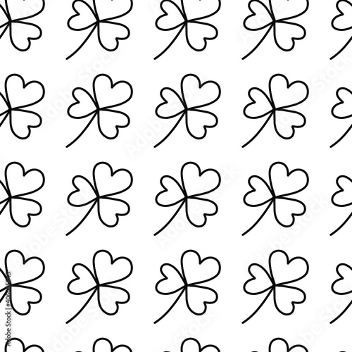 Cloverleaf shamrock doodle seamless pattern. Happy Saint Patricks day background design element. Festive greeting card decorative digital paper © Elena