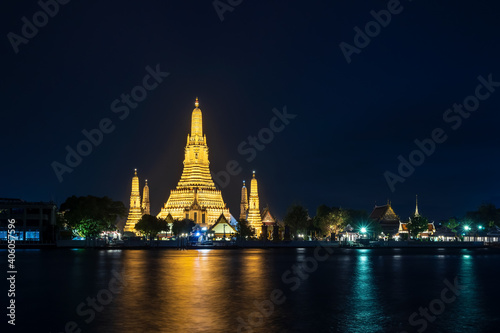 Wat Arun Ratchawararam (Temple of Dawn) and five pagodas at night, famous tourist destination in Bangkok, Thailand