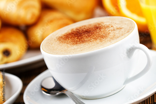 Breakfast with a Cup of a Typical Italian Cappuccino. 