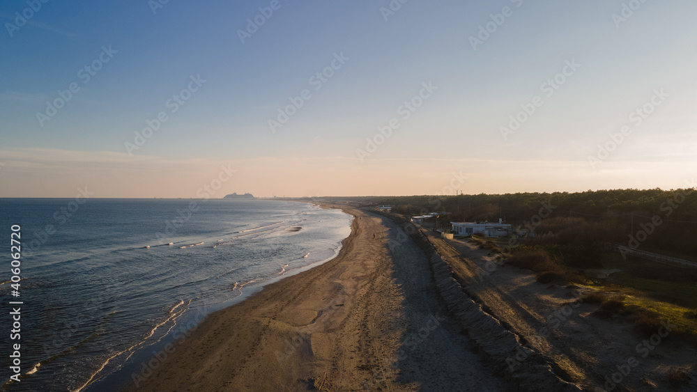 Photographing with an aerial shot the panorama of the sea of Emilia Romagna in Italy. The sea in winter filmed by drone.
