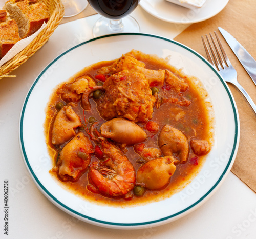 Seafood zarzuela, traditional Catalan festive stew from fish, shrimps, cuttlefish and mollusks