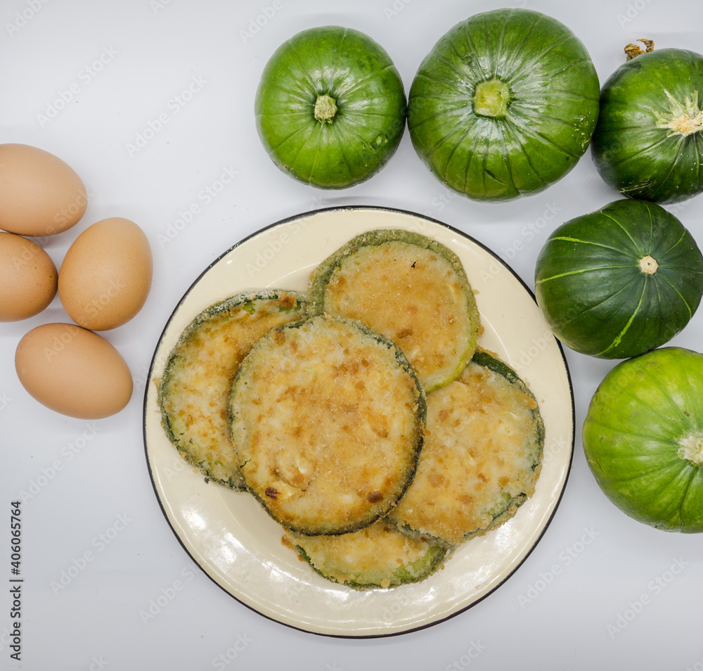 Trunk zucchini in baked or fried milanesas, Argentine cuisine Trunk zucchini in baked or fried milanesas, Argentine cuisine