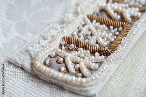 Embroidery of a traditional russian headdress in the technique of pearl sewing. photo