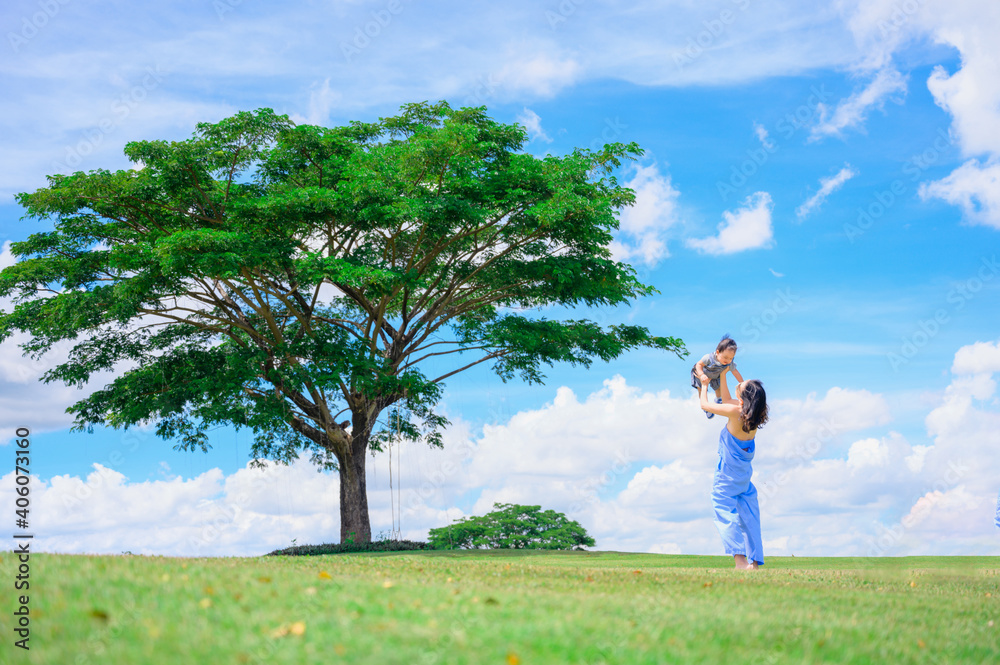 Mother And Baby outdoors. Nature.Portrait of happy loving mother and her baby outdoors Mother And Baby outdoors. Nature.Portrait of happy loving mother and her baby outdoors