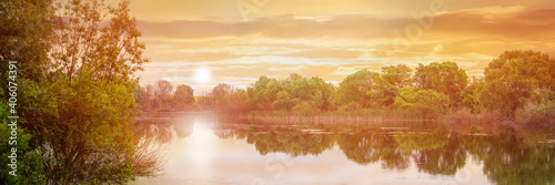 Summer view of the river at sunset, summer banner, panorama