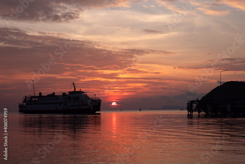 Raja Ferry arrive to koh Phangan pier in sunset time