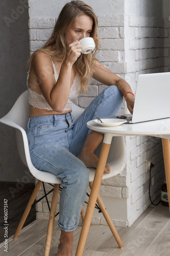 Beautiful lady is sitting with notebook. Working people. 