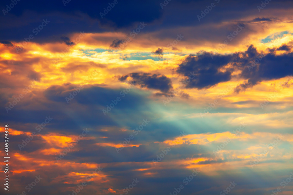 Sun rays in colorful clouds .  Fantastic sky in the dusk 
