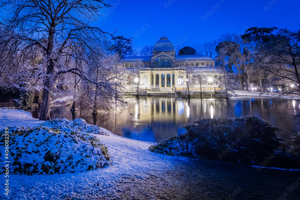 Cityscape of Madrid on a Snowy night at the Retiro Park