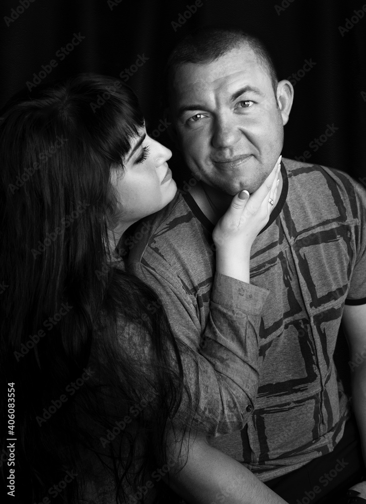 Black and white photoshoot of a couple in the studio Black and white photoshoot of a couple in the studio