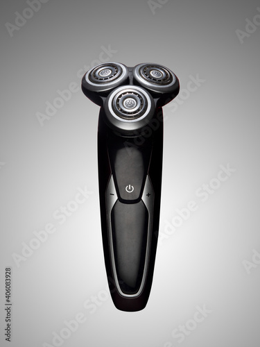 Foto electric shaver isolated on gray