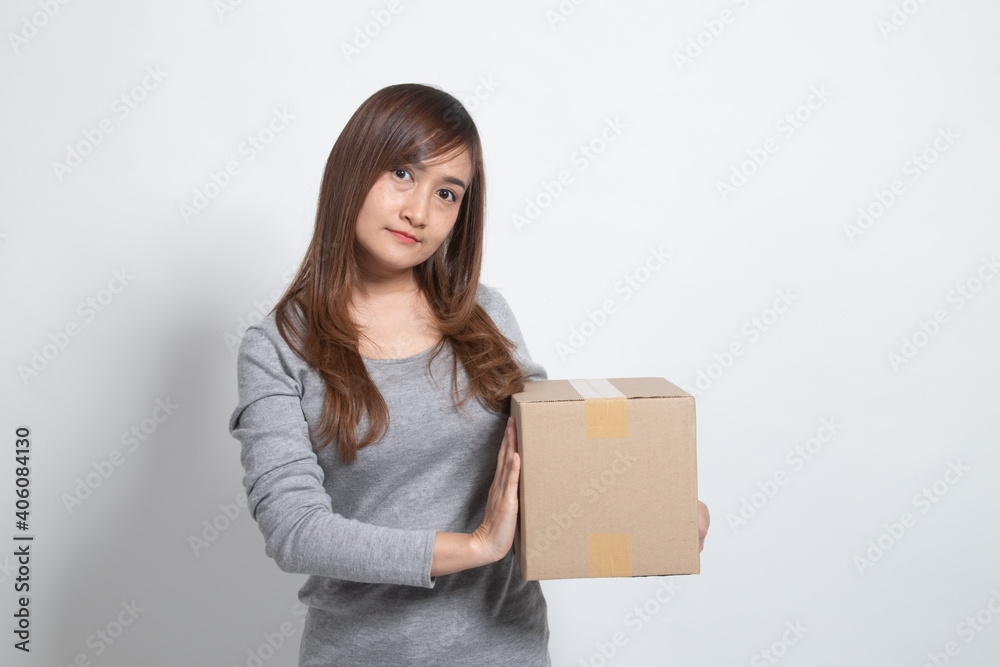 Delivery, relocation and unpacking. young asian woman holding cardboard box. Delivery, relocation and unpacking. young asian woman holding cardboard box.