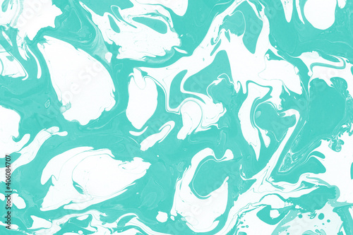 Aqua marble ink texture on watercolor paper background. Marble stone image. Bath bomb effect. Psychedelic biomorphic art.