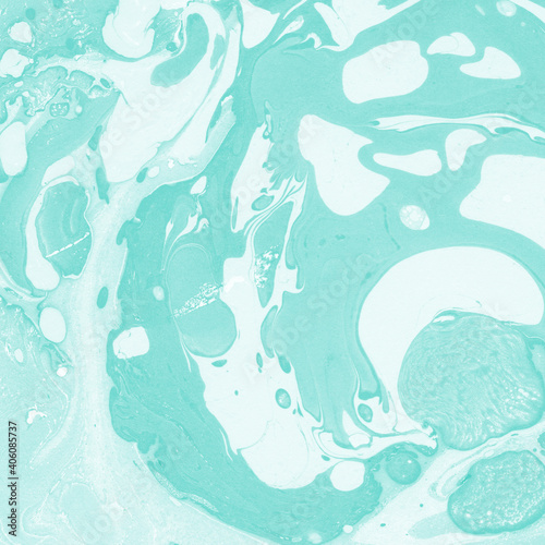 Aqua marble ink texture on watercolor paper background. Marble stone image. Bath bomb effect. Psychedelic biomorphic art.