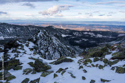 Winter mountains panoramic view with clouds. Tatras mountain in poland europe. Koscielec