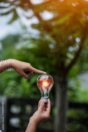 light bulb against nature, icons