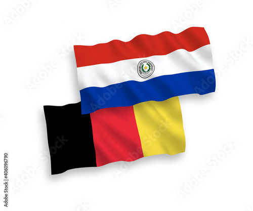 National vector fabric wave flags of Paraguay and Belgium isolated on white background. 1 to 2 proportion.