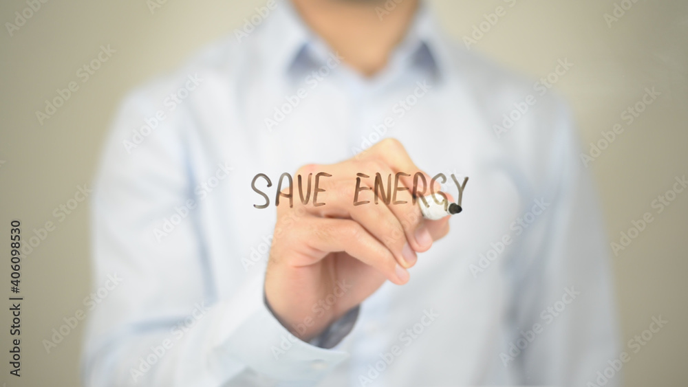 Save Energy, Man Writing on Transparent Screen Save Energy, Man Writing on Transparent Screen
