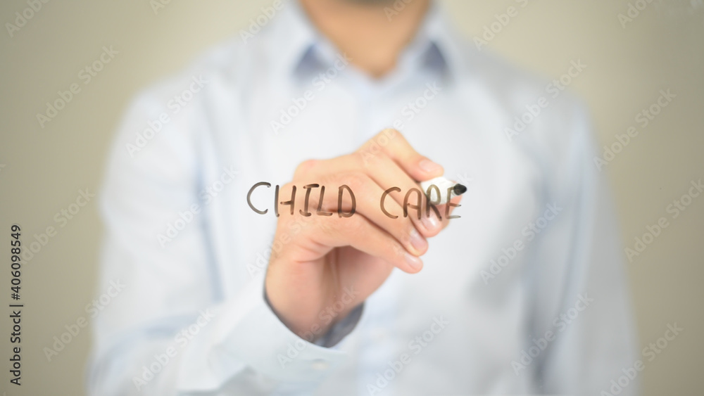 Child Care, Man writing on transparent screen Child Care, Man writing on transparent screen
