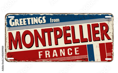 Greetings from Montpellier vintage rusty metal plate