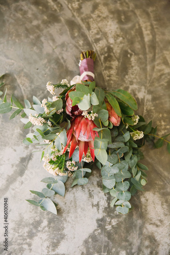 Wedding flower bouquet with protea and greenery