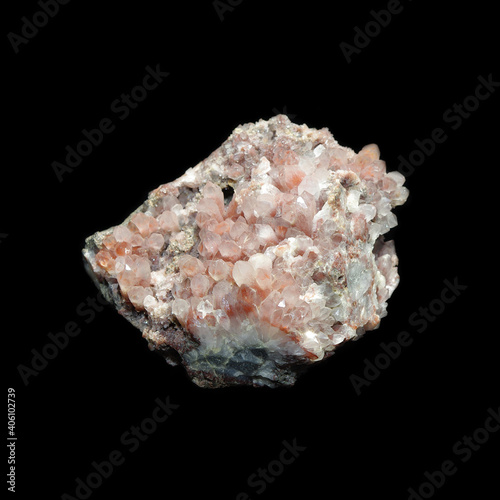 rock crystal with haematite druse on black background 