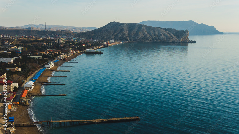 Sudak bay with colorful Black sea, piers and mountains