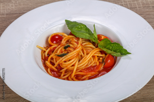 Vegetarian pasta with tomato and basil
