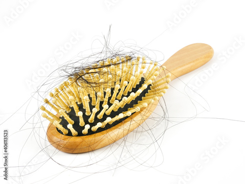 Hairs fall with comb or hairbrush isolated on white background,concept medical hair transplants or serious hair loss problem