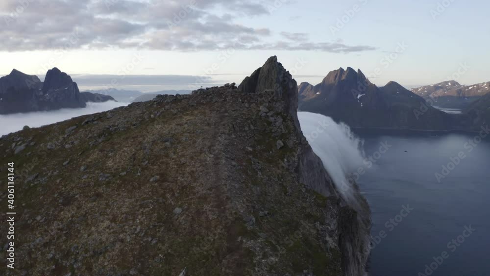 Incredible peak of Segla mountain diving into a beautiful Norwegian fjord Segla, lofoten island, Norway