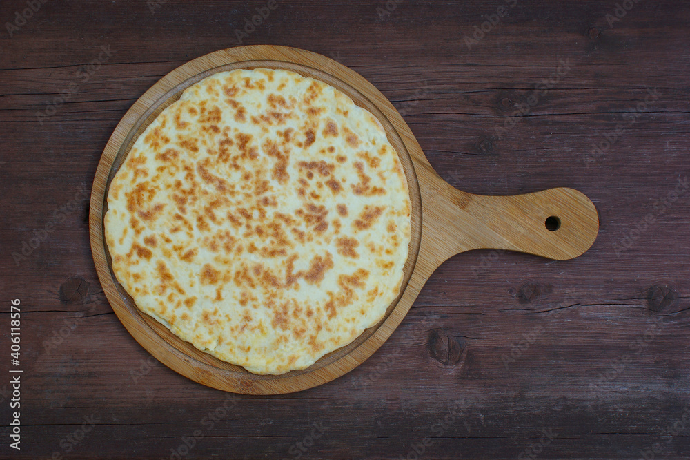 Georgian khachapuri imeruli. Georgian traditional food, hot khachapuri Georgian khachapuri imeruli. Georgian traditional food, hot khachapuri