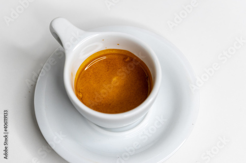 a cup of coffee on the table espresso