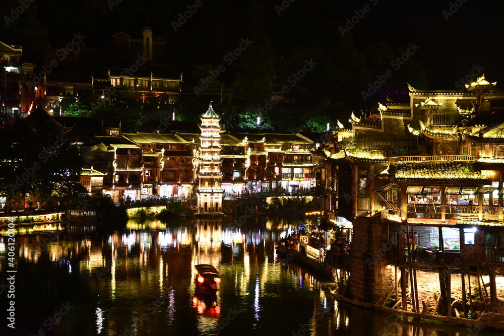 Night view on the streets and river of the city of Fenghuang, China